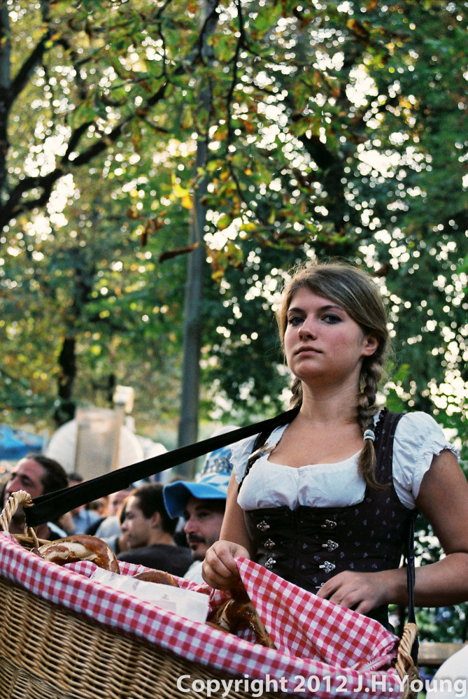 woman selling traditional snacks at Oktoberfest