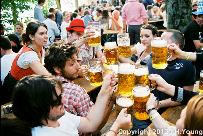 Revelers drinking beer at Oktoberfest