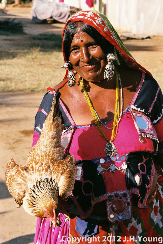 village women with chicken